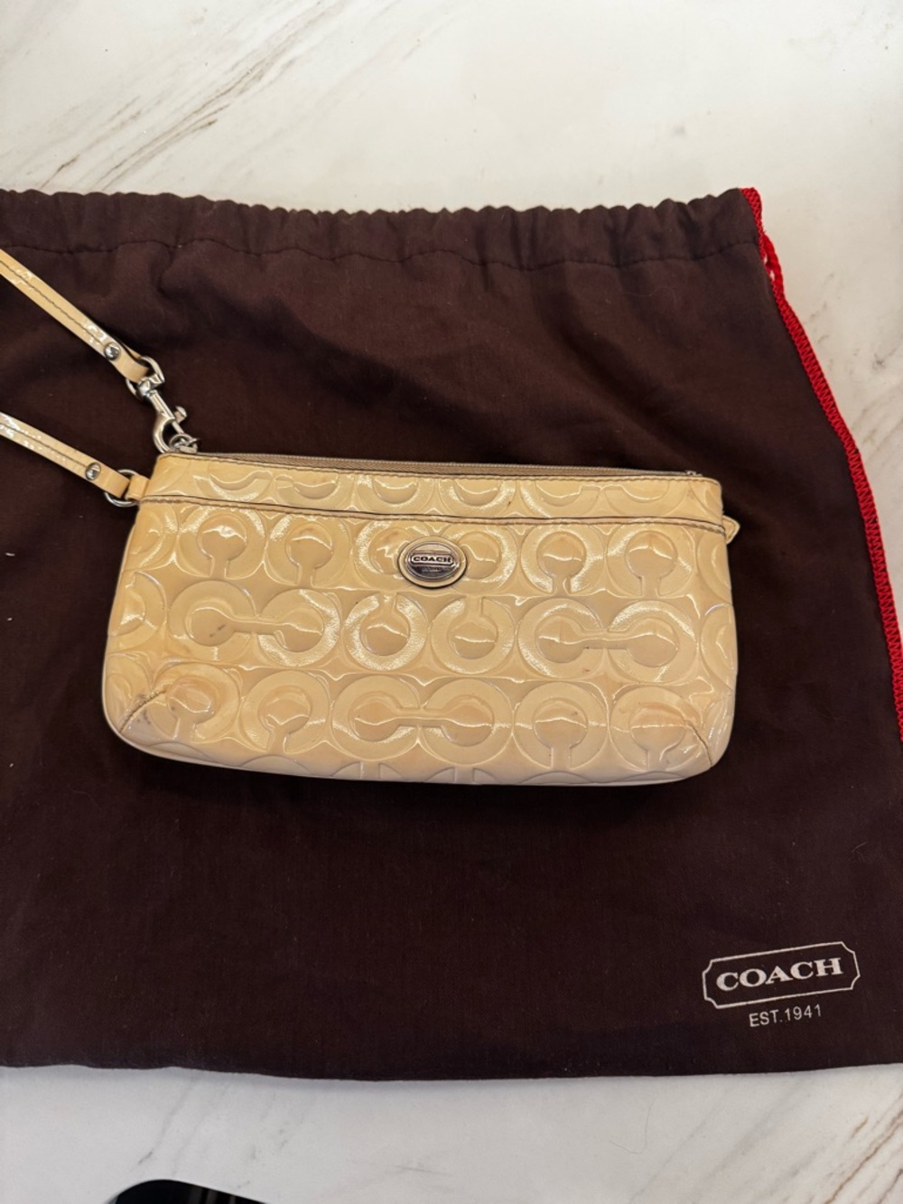 COACH Beige Patent Leather Signature Wristlet